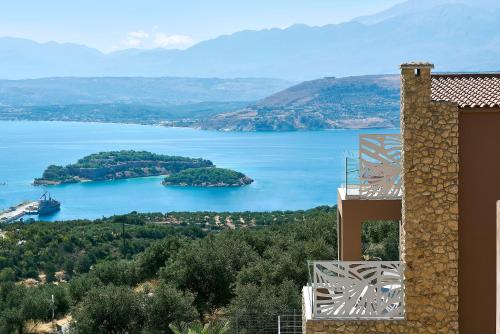 a view of a large body of water with islands at Villa Niolos II in Stérnai