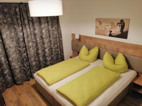 A bed or beds in a room at Apartment Panorama