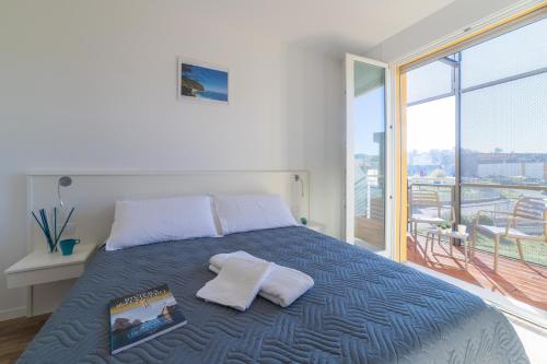 Posteľ alebo postele v izbe v ubytovaní ASPIO RESIDENCE