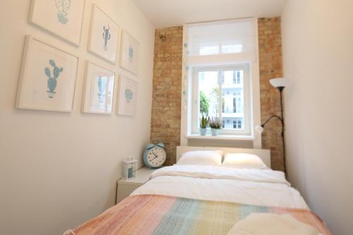 Posteľ alebo postele v izbe v ubytovaní Apartament Wilda Nova