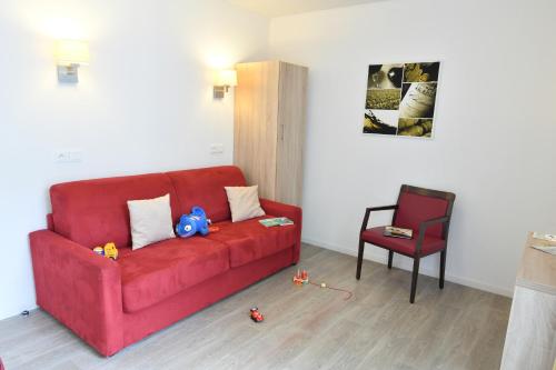 Ruang duduk di Appart-Hôtel Mer & Golf City Bordeaux Bassins à flot