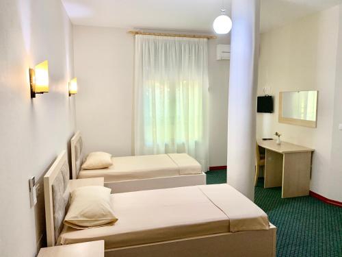 Postel nebo postele na pokoji v ubytování Kriva Resort