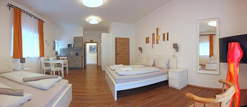 Posteľ alebo postele v izbe v ubytovaní Nigler Innsbruck Apartment