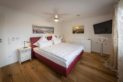 A bed or beds in a room at Premium Business Apartment Oberkochen Zentrum