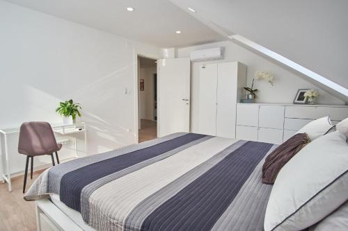 Ένα ή περισσότερα κρεβάτια σε δωμάτιο στο Apartman Rafi