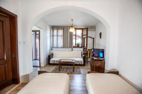 Postel nebo postele na pokoji v ubytování Oazis Family Hotel