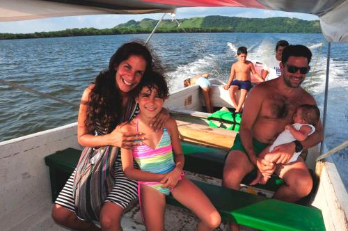 a group of people on a boat on the water at Cabañas Ecobiosfera in Catemaco