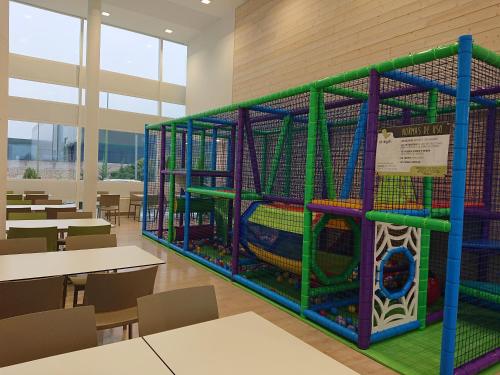a play structure in a classroom with tables at Hotel Las Terrazas in Burgos