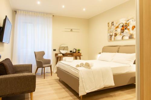 A bed or beds in a room at Prati 25.7 Suites in Rome