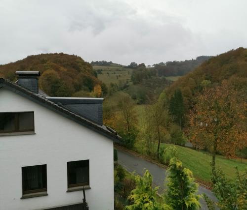 a white house with a view of a river at Lavender Hill in Messinghausen