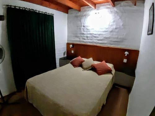 Ένα ή περισσότερα κρεβάτια σε δωμάτιο στο Apart Cabañas La Estancia