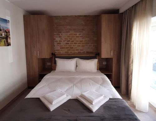 Кровать или кровати в номере Urban Lodge Belgrade