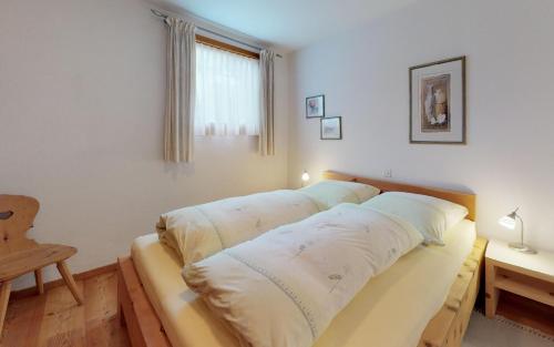 ツェエリーナにあるChampagnaのベッドルーム1室(枕2つ付)