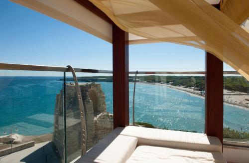 a room with a view of the ocean at Hotel Belvedere in Torre dell'Orso