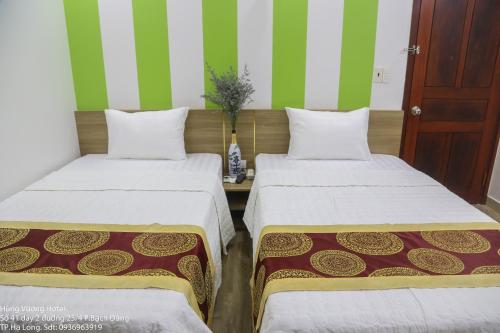 Hùng Vương Hotel Hạ Longにあるベッド