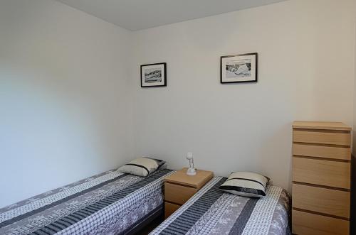 Postel nebo postele na pokoji v ubytování Sun&Sport Apartament CZYRNA SKI super lokalizacja niedaleko wyciągu