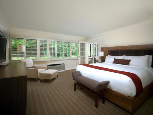 Topnotch Resort tesisinde bir odada yatak veya yataklar