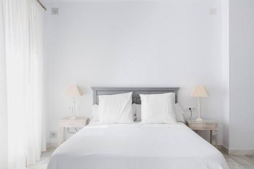 Posteľ alebo postele v izbe v ubytovaní Loft en primera linea del paseo marítimo