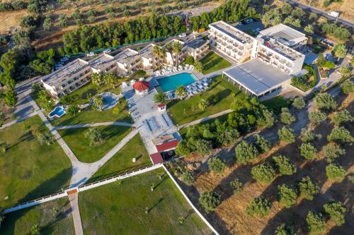 an overhead view of a campus with buildings and trees at Olive Garden Hotel in Lardos