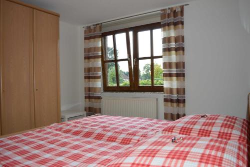 Postel nebo postele na pokoji v ubytování Ferienwohnung Schmidt, 95131