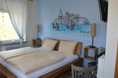 A bed or beds in a room at Romagna Mia - Hotel Ristorante Pizzeria