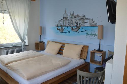 Ένα ή περισσότερα κρεβάτια σε δωμάτιο στο Romagna Mia - Hotel Ristorante Pizzeria