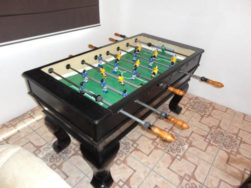 a table with a game of chess on it at Terramar Hoteles in Crucita
