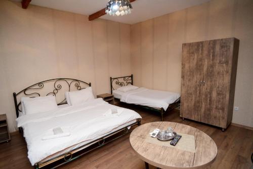 Postel nebo postele na pokoji v ubytování Hotel Ragnar
