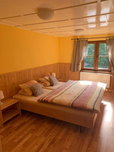 Postel nebo postele na pokoji v ubytování Penzion U Haliny