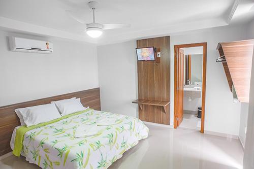 Cama ou camas em um quarto em Sollar hotel