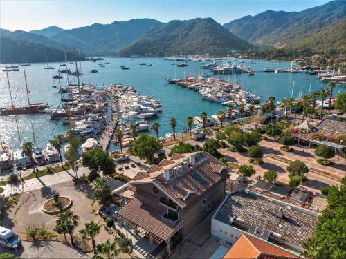 an aerial view of a harbor with boats in the water at Hotel Marina Bay Göcek in Göcek