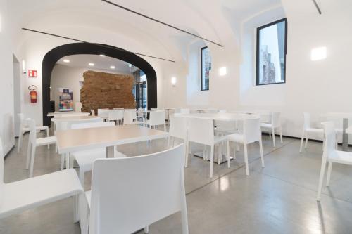 En restaurant eller et spisested på Hotel Cascina Fossata & Residence