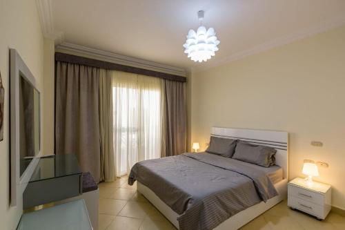 Voodi või voodid majutusasutuse One- bedroom apartment S3 in Vip Zone Sunny Lakes toas