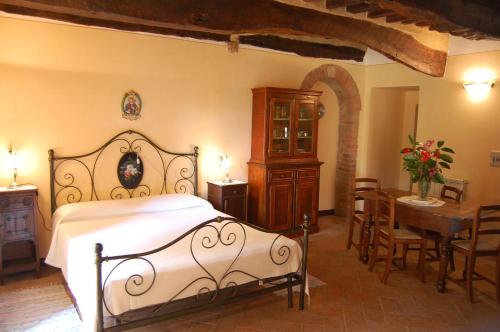 מיטה או מיטות בחדר ב-Agriturismo Casagrande