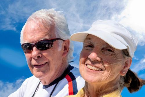 an older man and woman standing next to each other at Leech Lake Resort Bed & Breakfast in Walker