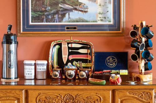 a wooden dresser with a bag on top of it at Leech Lake Resort Bed & Breakfast in Walker