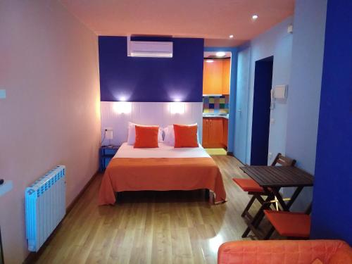 Katil atau katil-katil dalam bilik di Hospedium Aloque Posada Hotel Rural