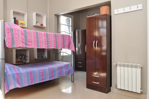 Postel nebo postele na pokoji v ubytování HA! 1 Resi para estudiantes