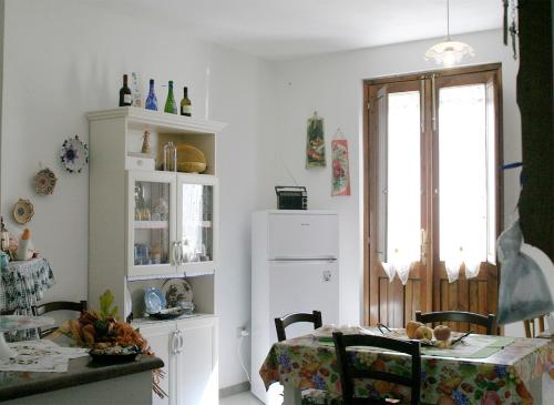 Kuchyň nebo kuchyňský kout v ubytování B&B S'ARROSA ANTIGA