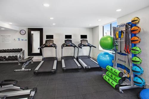 a gym with several treadmills and exercise bikes at Holiday Inn Express Exton - Great Valley by IHG in Exton