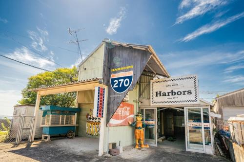 a fire hydrant is standing outside of a building at Harbors - Vacation STAY 54826 in Beppu