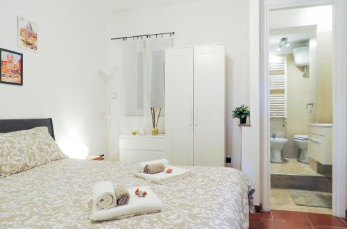מיטה או מיטות בחדר ב-Casa Sofia - beauty apartment close Vatican Museum