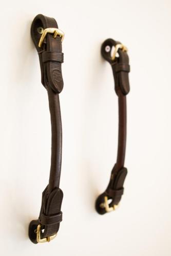 a pair of black handles on a white wall at The Stables, Beaulieu Kyalami in Midrand