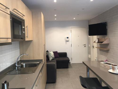 Kuchyň nebo kuchyňský kout v ubytování Sweet Apartment Las Canteras