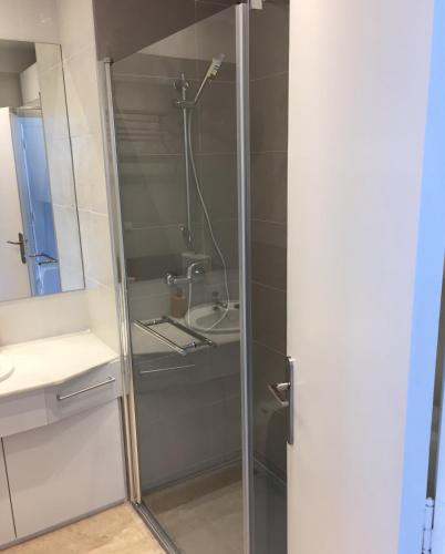 a shower with a glass door in a bathroom at Magical Sea View Studios II in Torremolinos