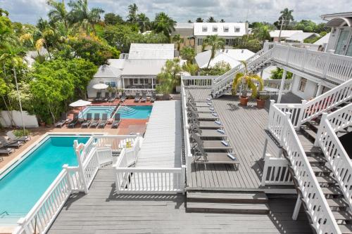an aerial view of a resort with a pool and deck at Nyah - Adult Exclusive in Key West