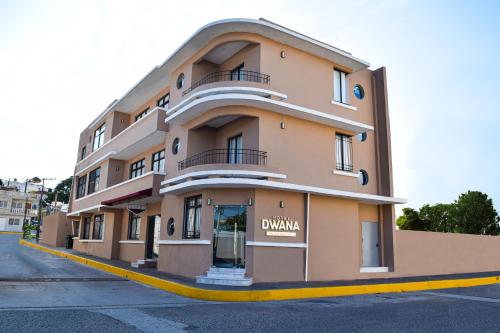 a large building on the side of a street at Hotel Dwana in Mazatlán