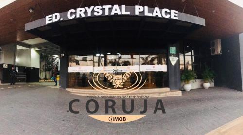 a building with a sign that reads croyula at Coruja Imob - Flat Crystal Place in Goiânia