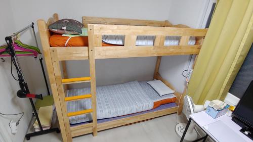 
A bunk bed or bunk beds in a room at Exclusive Use Whole House For You
