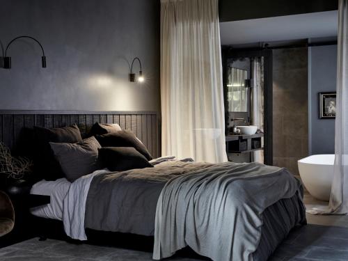 Llit o llits en una habitació de The Bower Byron Bay